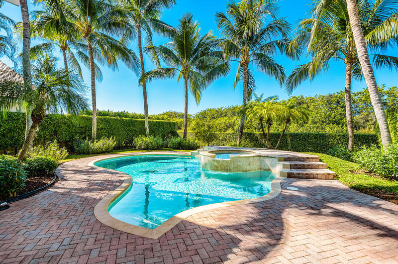 14364 Stroller Way Wellington, FL 33414 - Photo 11 of 47 a view of a garden with a slide