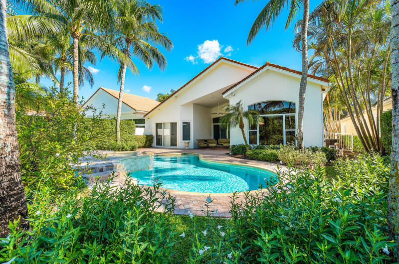 14364 Stroller Way Wellington, FL 33414 - Photo 15 of 47 a view of a house with a big yard plants and large trees