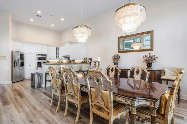 a bathroom with a sink vanity and a mirror