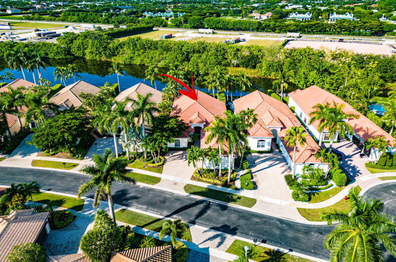 14364 Stroller Way Wellington, FL 33414 - Photo 28 of 47 an aerial view of residential houses with outdoor space and swimming pool