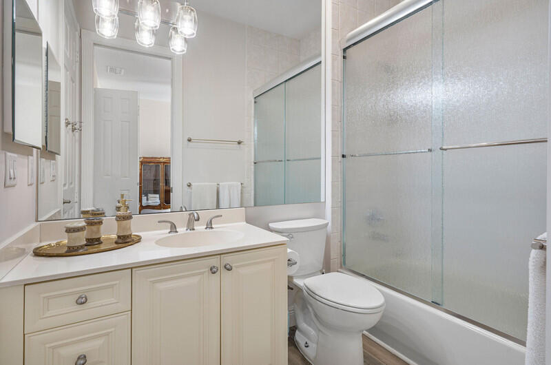 14364 Stroller Way Wellington, FL 33414 - Photo 29 of 47 a bathroom with a sink toilet vanity and shower