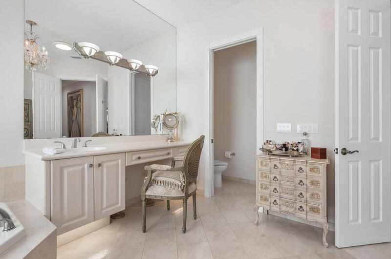 14364 Stroller Way Wellington, FL 33414 - Photo 34 of 47 a bathroom with a sink vanity and a mirror