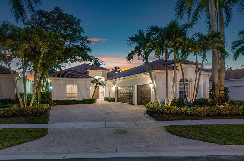 14364 Stroller Way Wellington, FL 33414 - Photo 37 of 47 a front view of house with yard and green space
