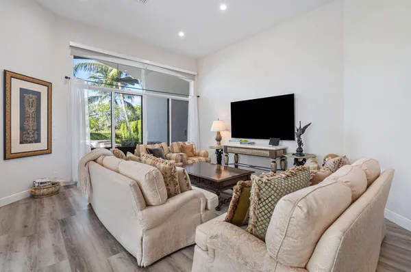 a view of lake with green space