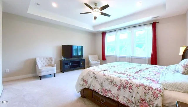 a bathroom with a granite countertop sink and a bathtub