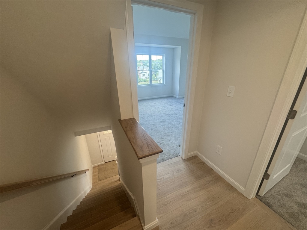 19 Ambrose Way, Unit 19 Shirley, MA 01464 - Photo 7 of 21 an entryway with a workspace