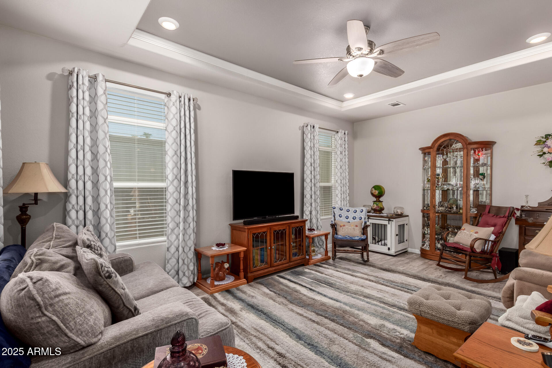 2929 East Main Street, Unit 160 Mesa, AZ 85213 - Photo 11 of 29 a living room with furniture and a flat screen tv