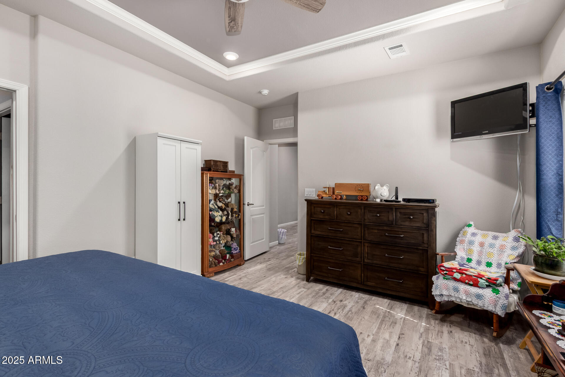 2929 East Main Street, Unit 160 Mesa, AZ 85213 - Photo 13 of 29 a bedroom with a bed and furniture