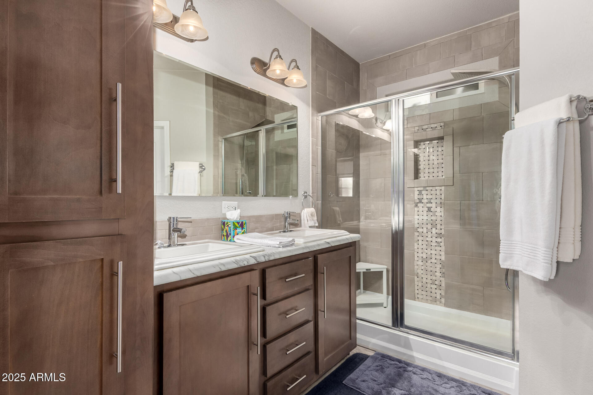 2929 East Main Street, Unit 160 Mesa, AZ 85213 - Photo 15 of 29 a bathroom with a shower sink and mirror