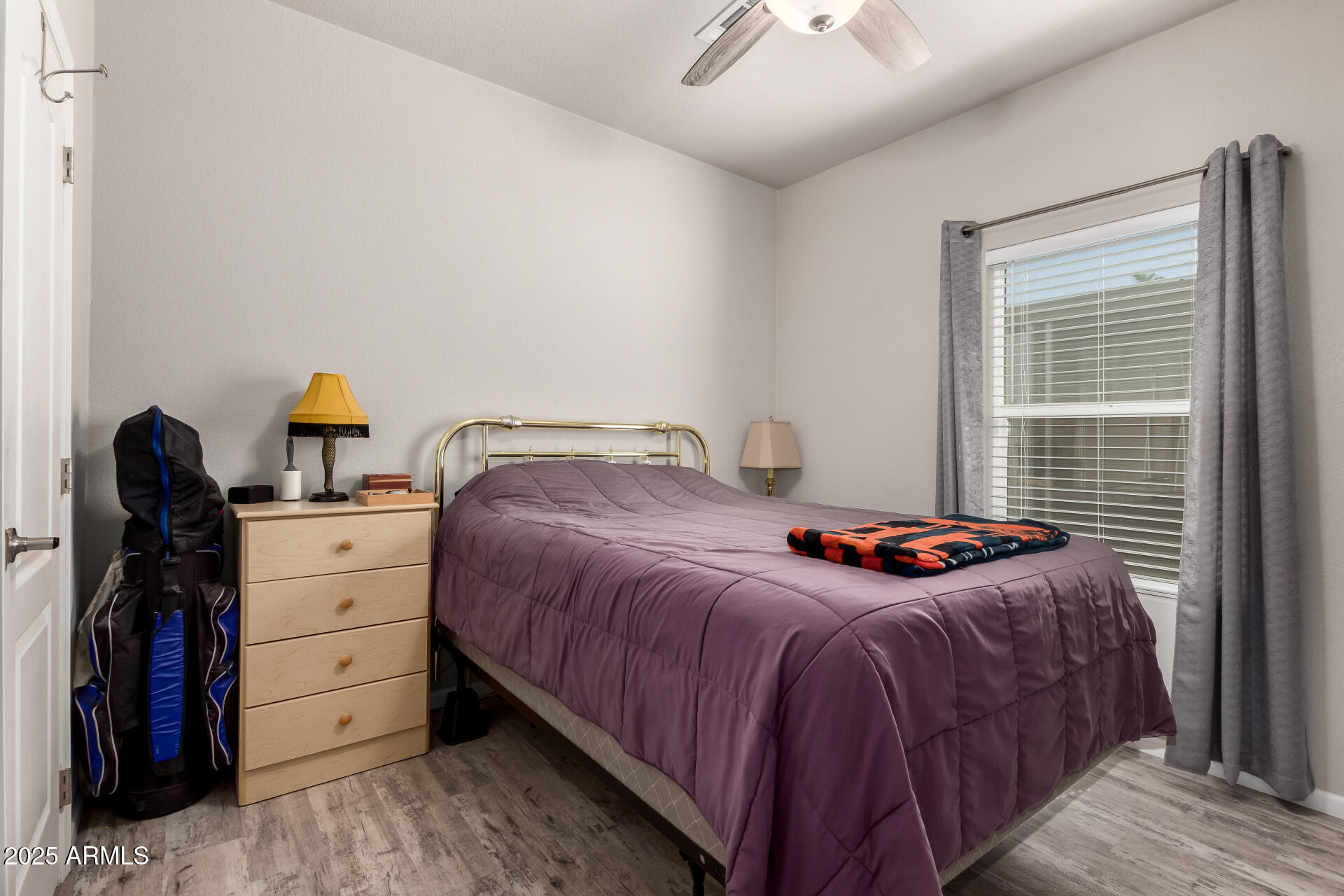 2929 East Main Street, Unit 160 Mesa, AZ 85213 - Photo 17 of 29 a bedroom with a bed and a window
