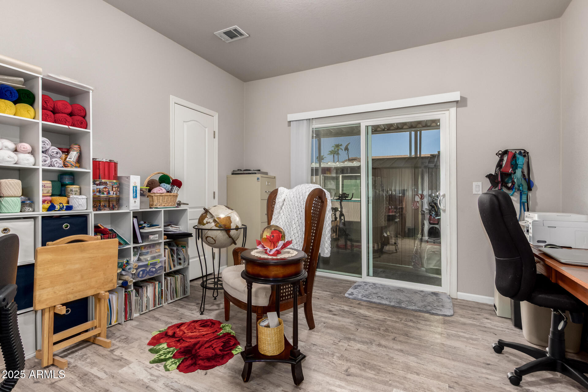 2929 East Main Street, Unit 160 Mesa, AZ 85213 - Photo 20 of 29 a dining room with furniture and wooden floor