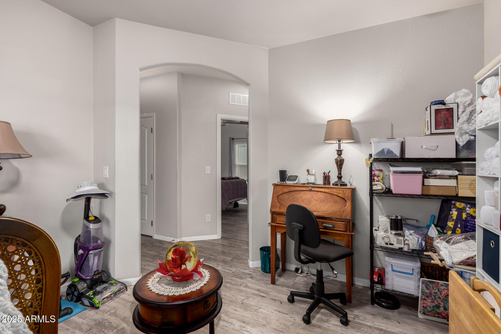 2929 East Main Street, Unit 160 Mesa, AZ 85213 - Photo 21 of 29 a view of a workspace with furniture and a livingroom