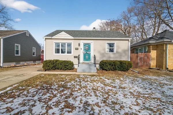 front view of a house with a small yard