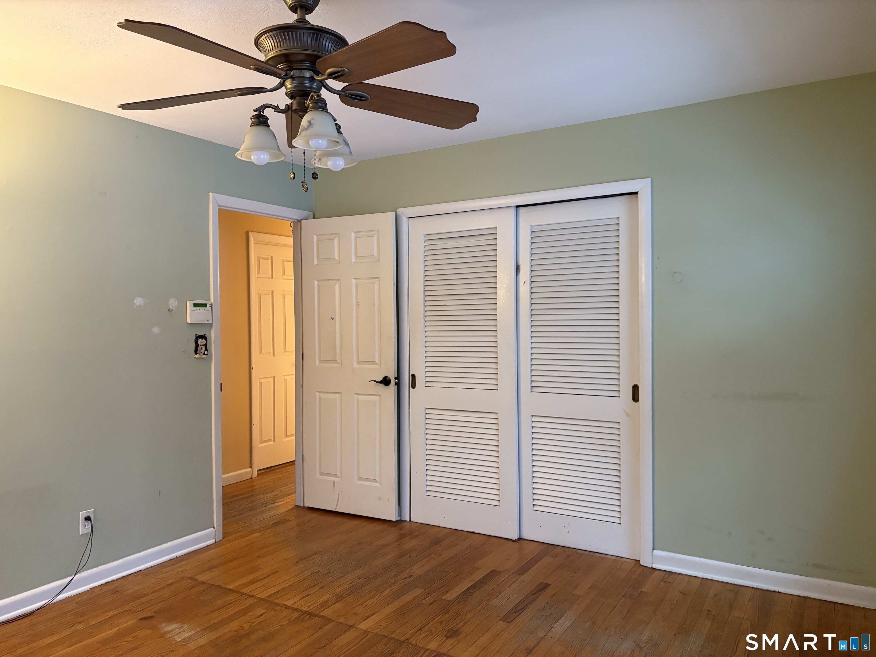 100 North Airline Road Wallingford, CT 06492 - Photo 12 of 40 The 1st floor full bathroom is steps away from bedroom 1, making it perfect for a 1st floor primary. This room can also be used as an office or den.