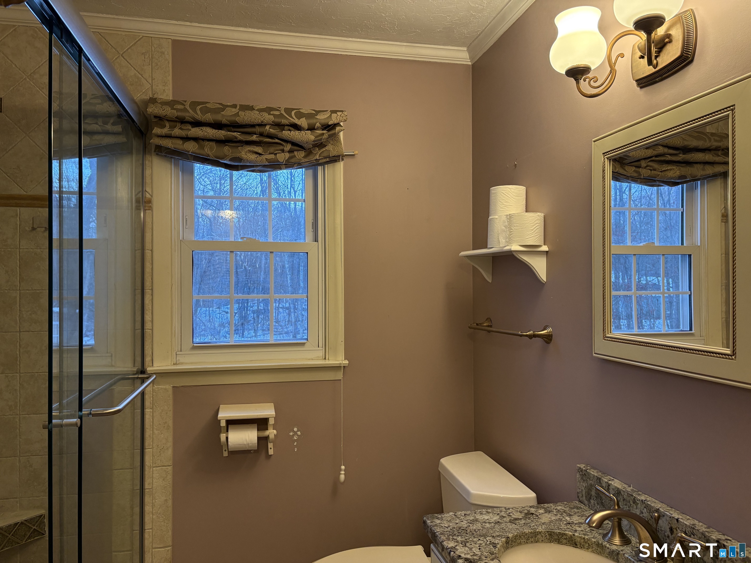 100 North Airline Road Wallingford, CT 06492 - Photo 16 of 40 The 1st floor bathroom has been remodeled and offers a spa-like atmosphere.