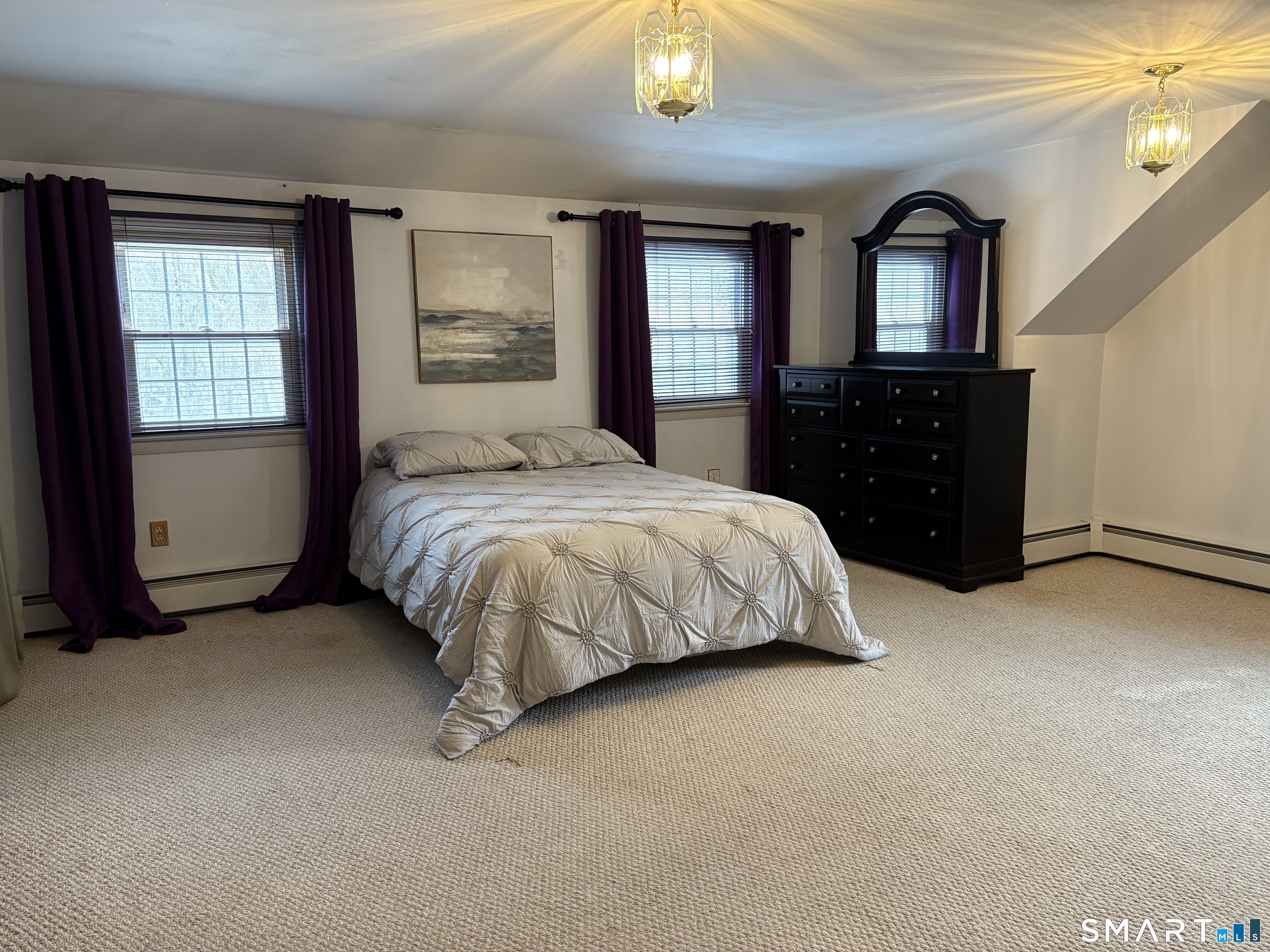 100 North Airline Road Wallingford, CT 06492 - Photo 20 of 40 At the end of the day you'll be able to relax and drift of to sleep in the calming, cheerful room.