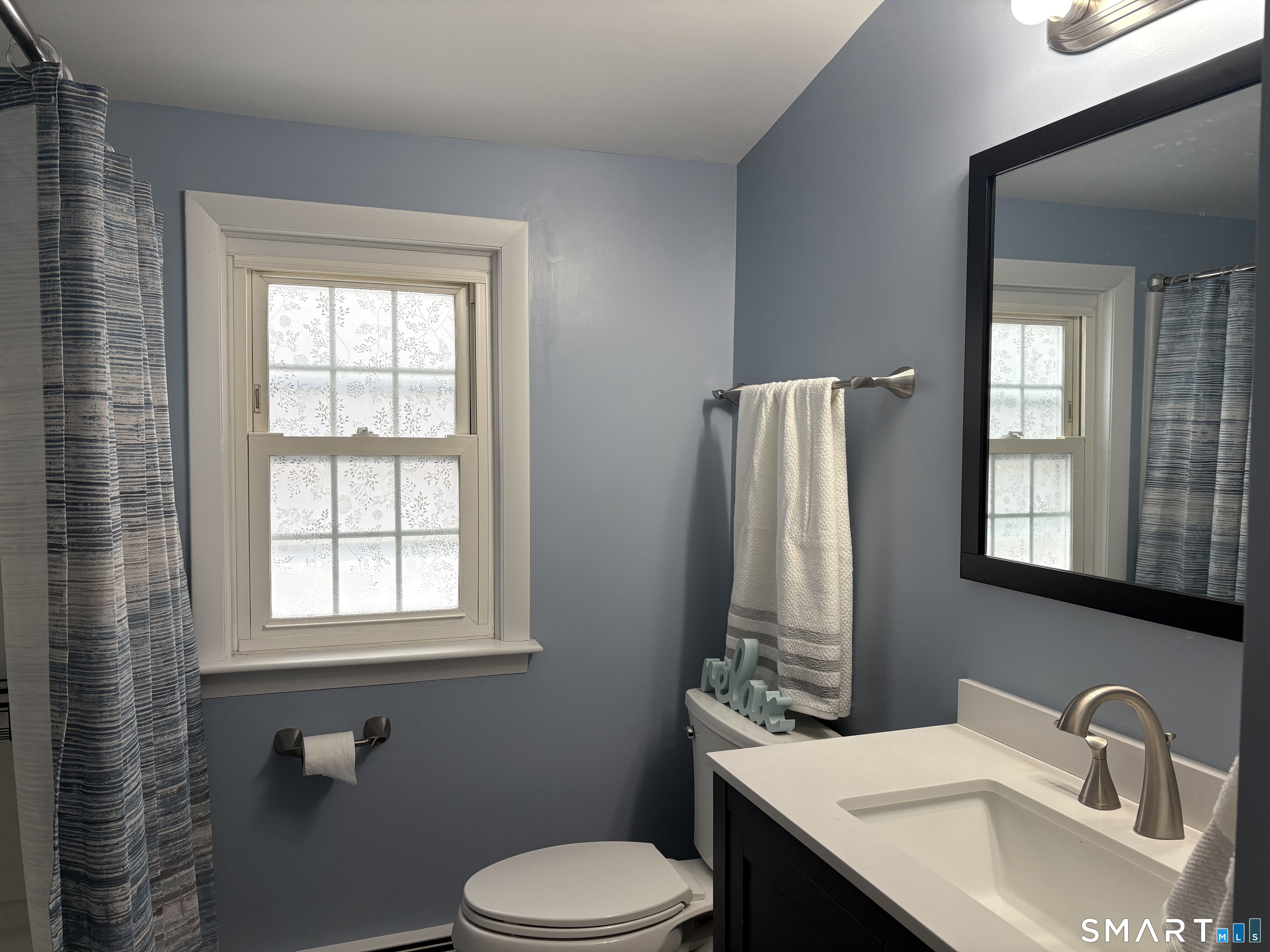 100 North Airline Road Wallingford, CT 06492 - Photo 27 of 40 The modern, light and fresh bathroom is a great space to get ready for the start of your day.