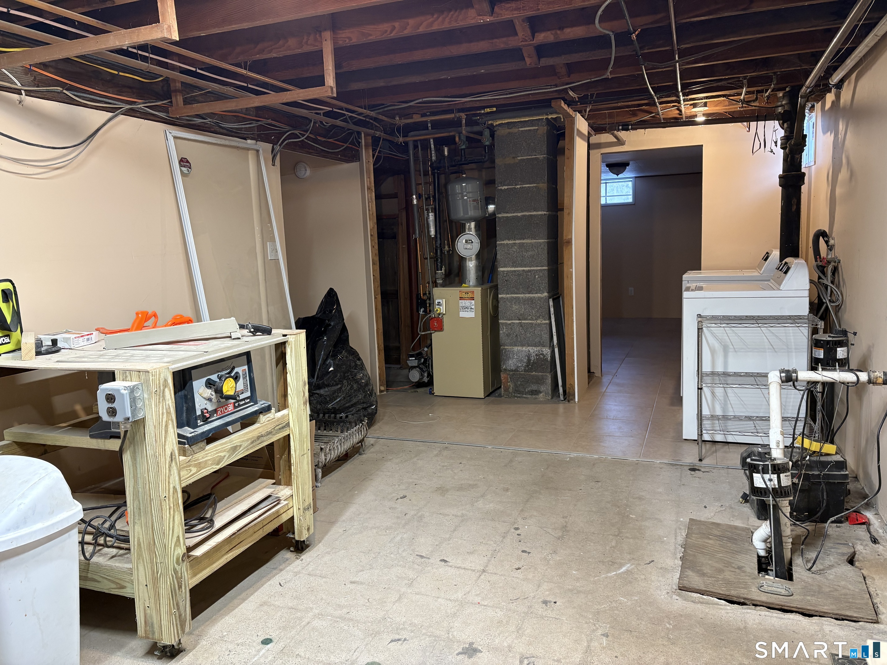 100 North Airline Road Wallingford, CT 06492 - Photo 33 of 40 Another view of the work/storage/laundry space.