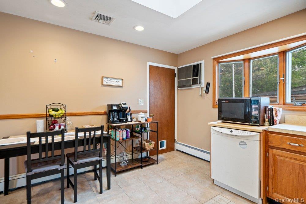 101 Sexton Road West Babylon, NY 11704 - Photo 13 of 33 a view of a dining room with furniture and window
