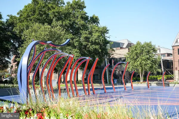 a view of a park with large trees
