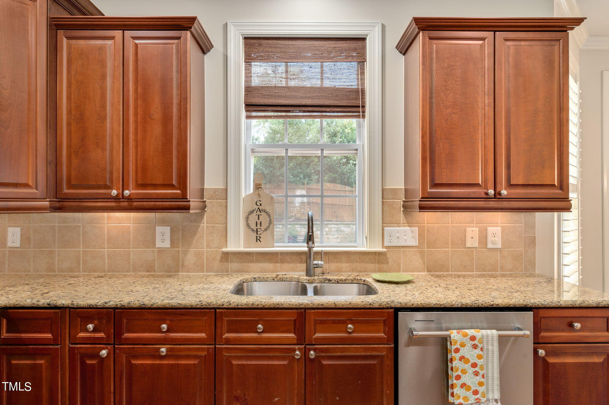 11519 Azari Court Raleigh, NC 27614 - Photo 17 of 55 a kitchen with granite countertop cabinets sink and window