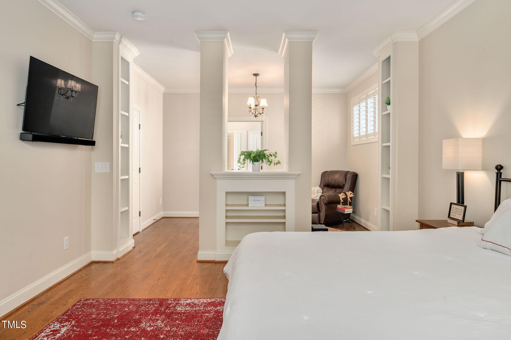 11519 Azari Court Raleigh, NC 27614 - Photo 23 of 55 a bed room with a bed a television and a window