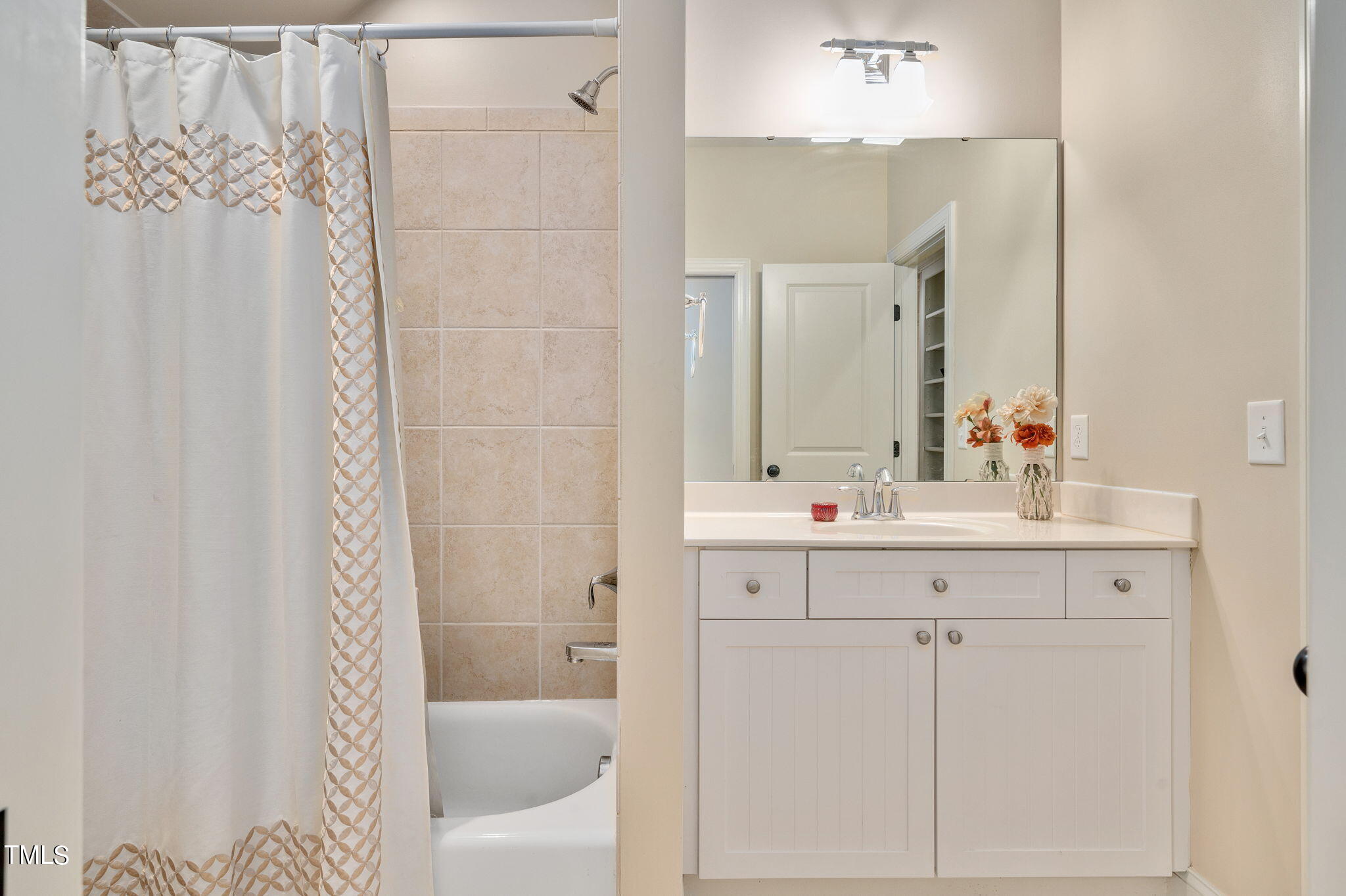 11519 Azari Court Raleigh, NC 27614 - Photo 30 of 55 a bathroom with a sink and a mirror