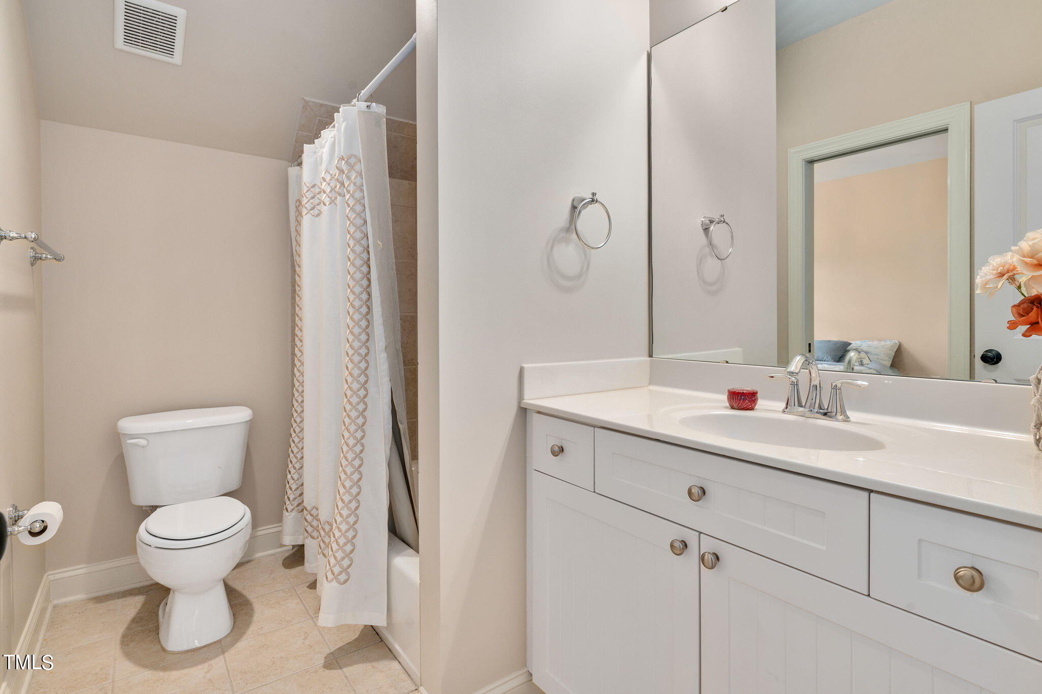 11519 Azari Court Raleigh, NC 27614 - Photo 31 of 55 a bathroom with a toilet sink and mirror