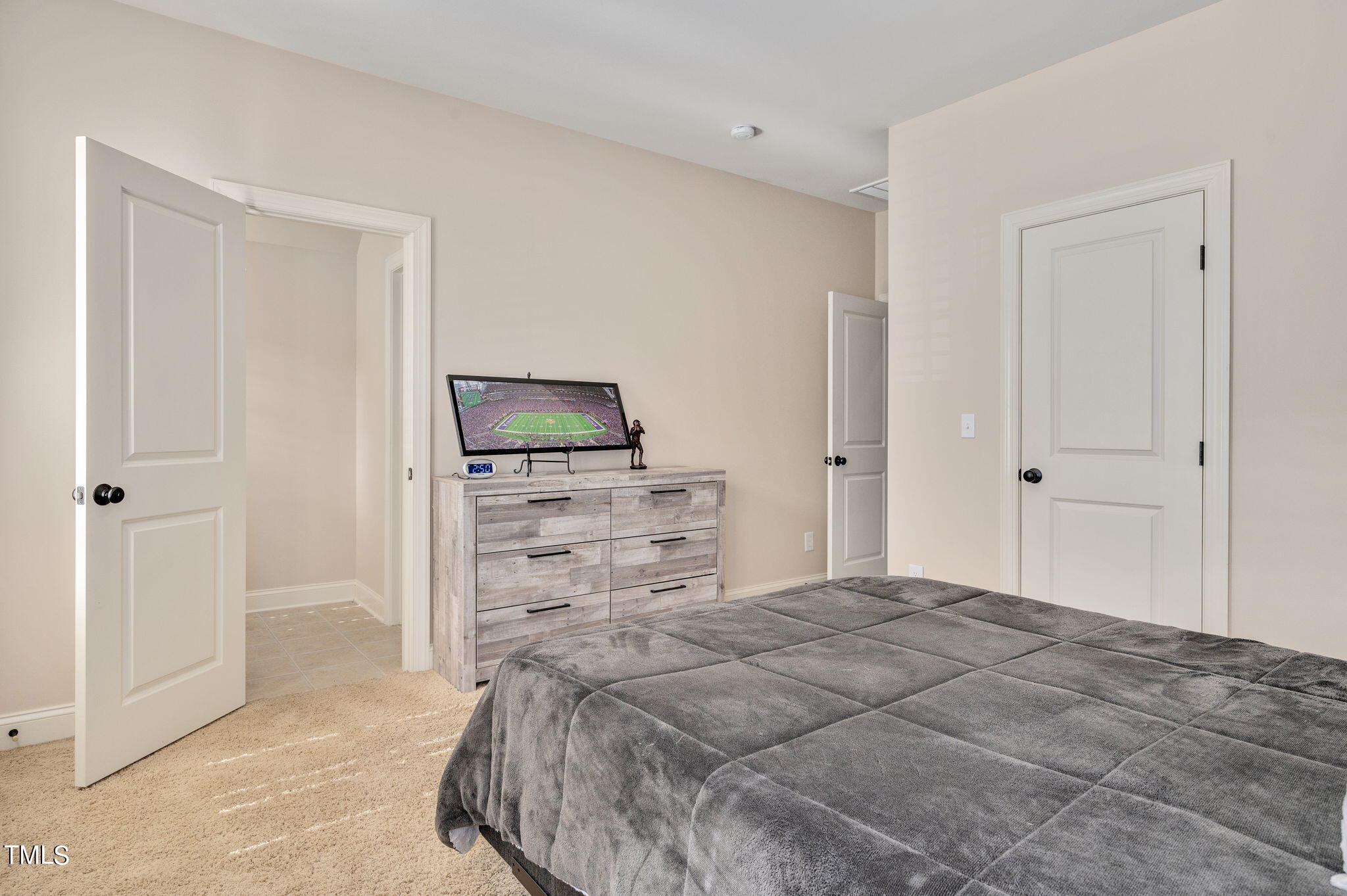 11519 Azari Court Raleigh, NC 27614 - Photo 34 of 55 a bed room with a bed and a television