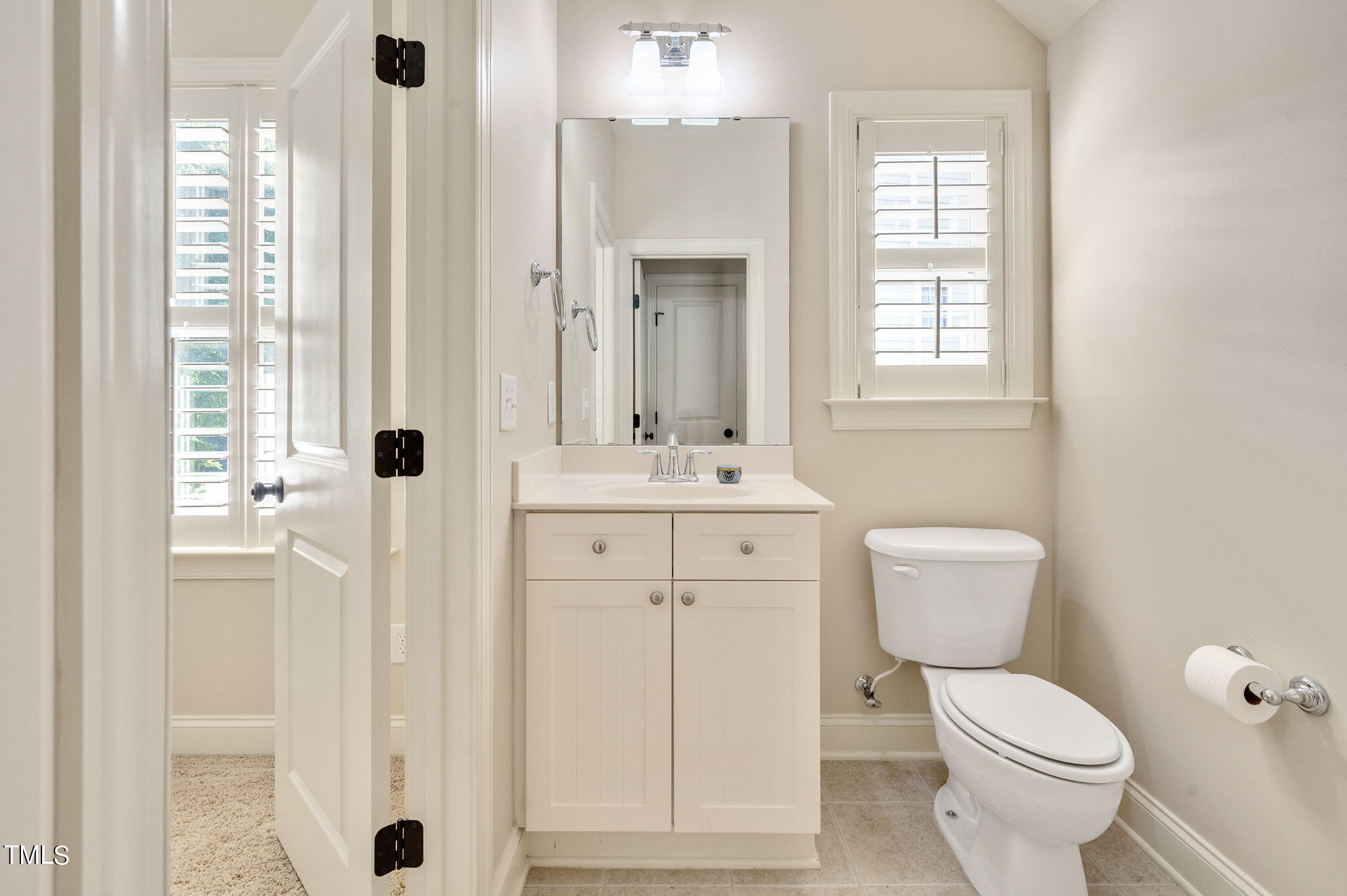 11519 Azari Court Raleigh, NC 27614 - Photo 35 of 55 a bathroom with a toilet sink and shower