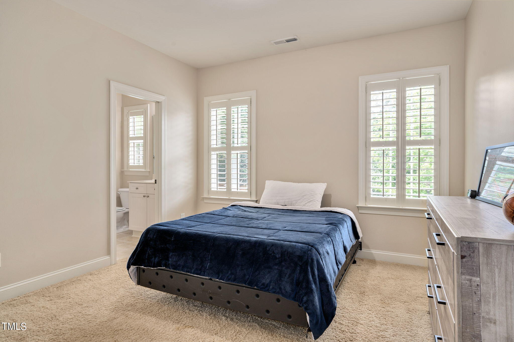 11519 Azari Court Raleigh, NC 27614 - Photo 36 of 55 a bedroom with a bed and window