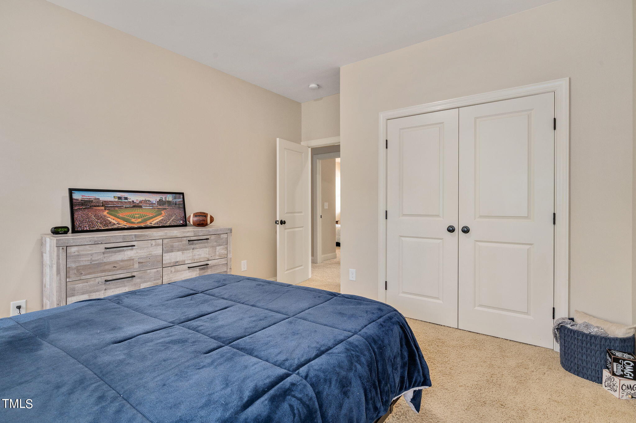 11519 Azari Court Raleigh, NC 27614 - Photo 37 of 55 a bedroom with a bed and a dresser