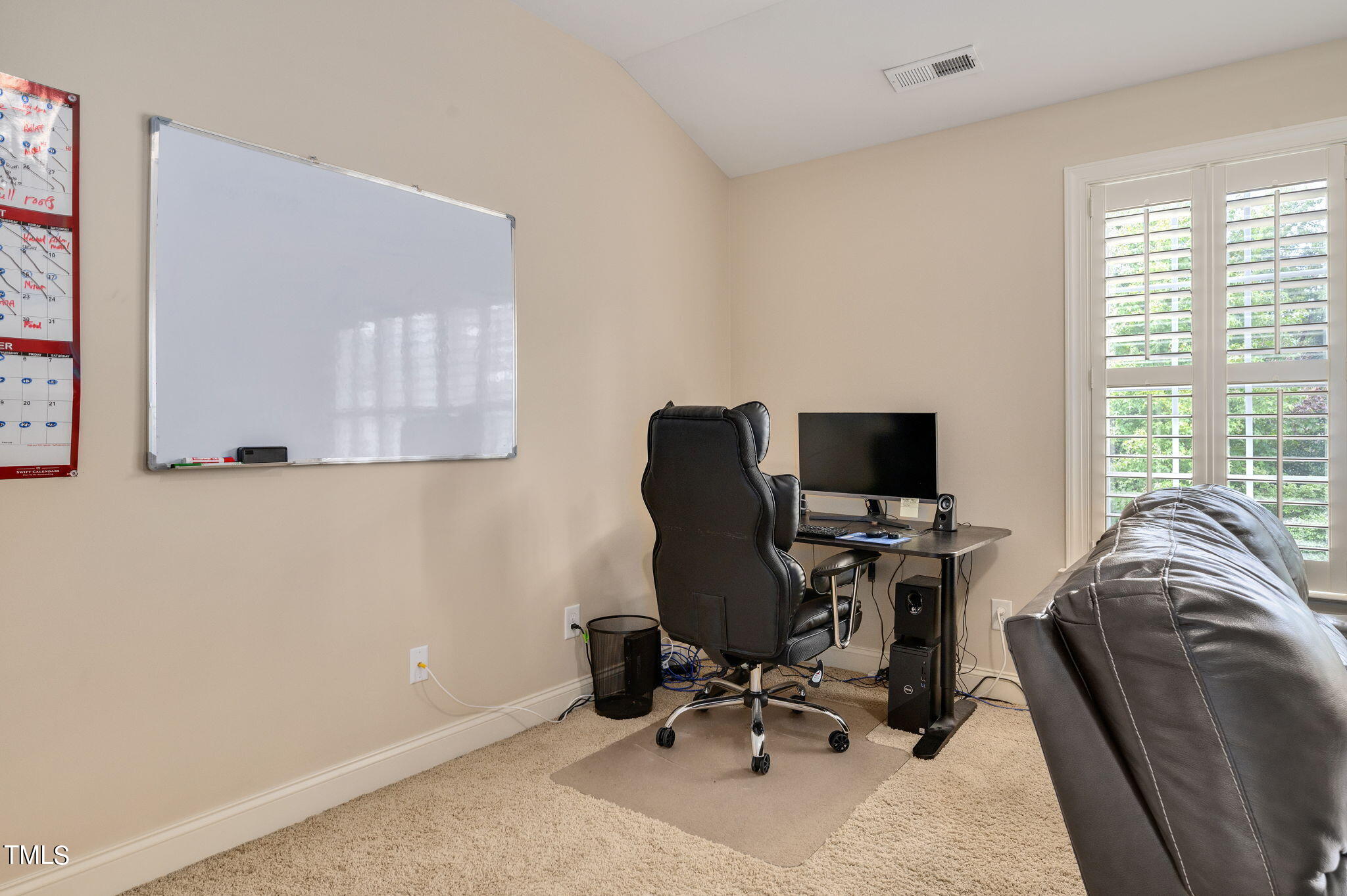 11519 Azari Court Raleigh, NC 27614 - Photo 42 of 55 a view of a workspace with furniture and a window