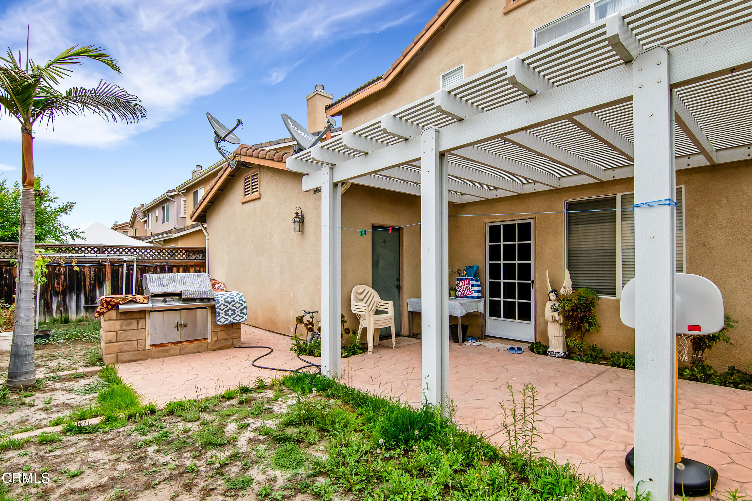 1611 Sonata Drive Oxnard, CA 93030 - Photo 25 of 25 a front view of a house with patio
