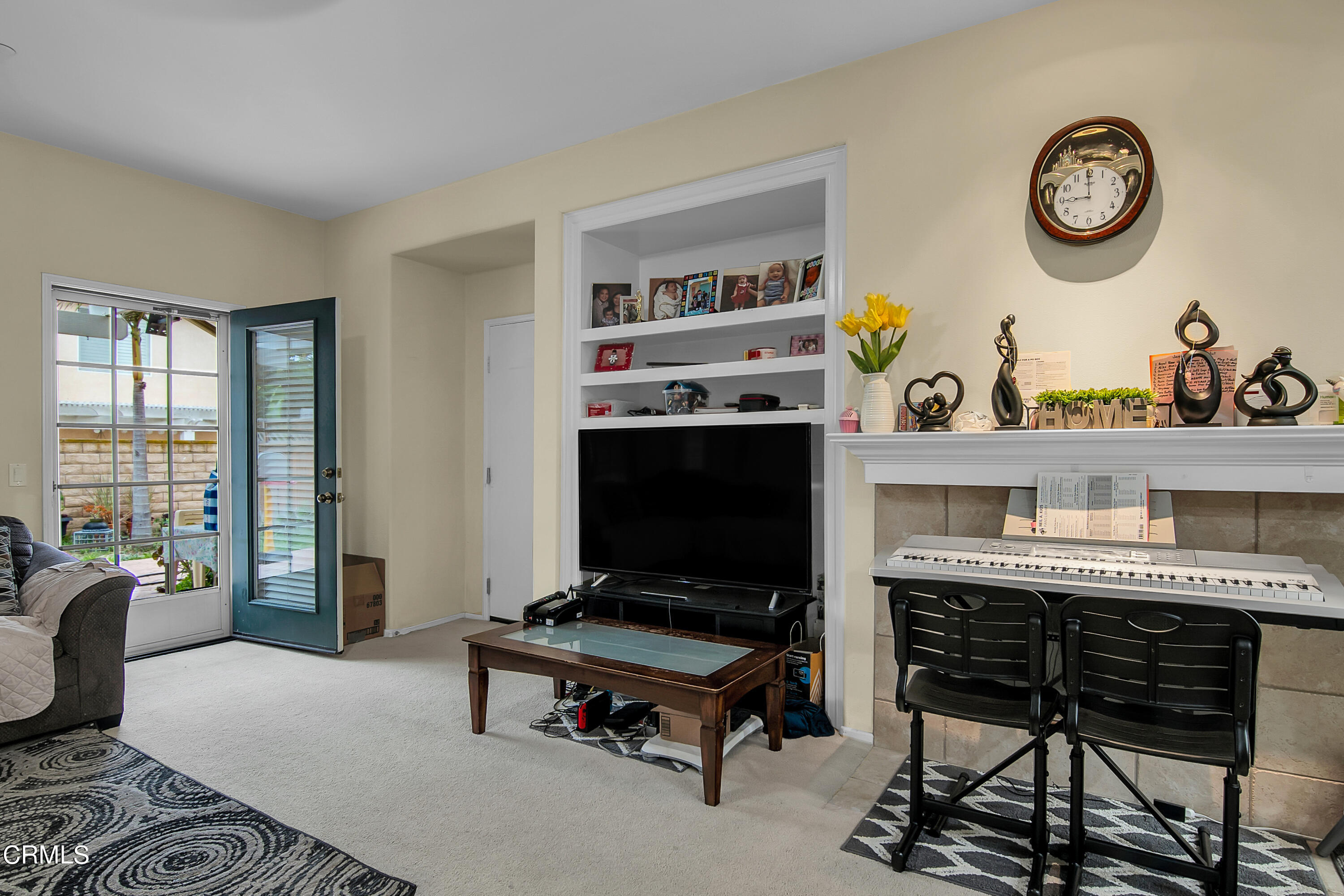 1611 Sonata Drive Oxnard, CA 93030 - Photo 3 of 25 a living room with furniture a rug and a window