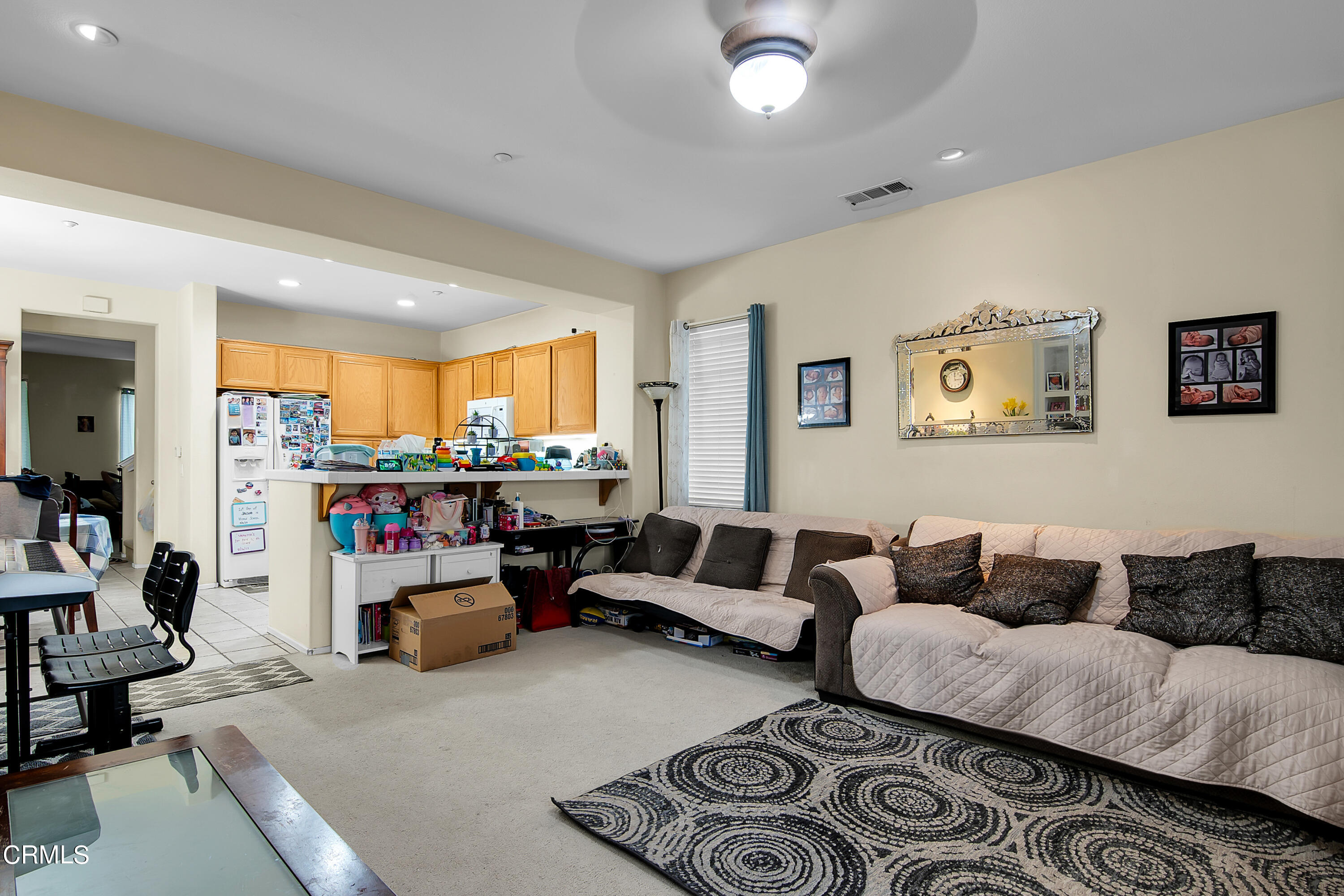 1611 Sonata Drive Oxnard, CA 93030 - Photo 5 of 25 a living room with furniture and a large window