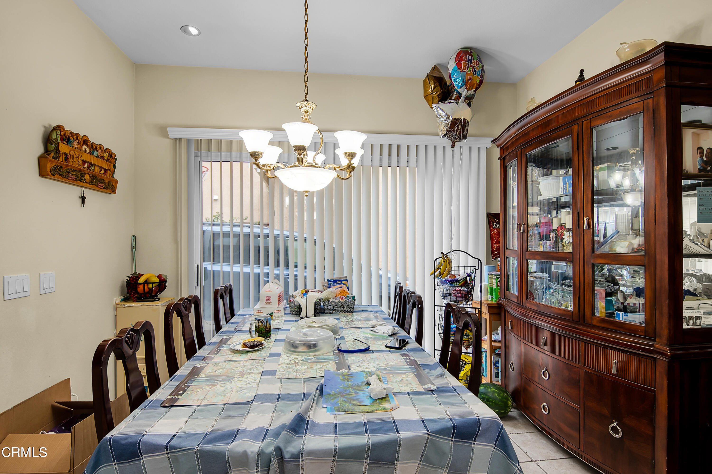 1611 Sonata Drive Oxnard, CA 93030 - Photo 6 of 25 a view of a dining room and hall with furniture