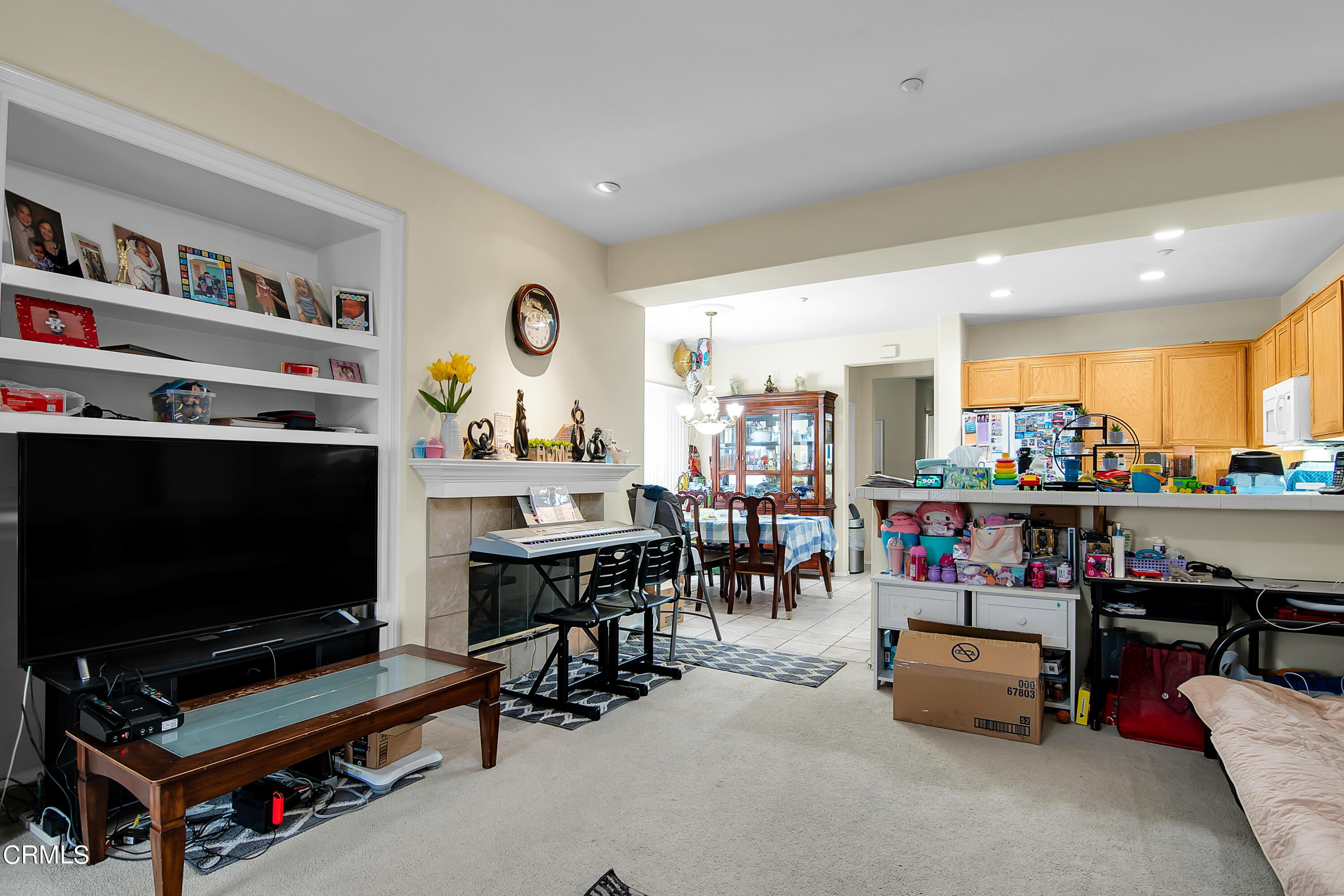 1611 Sonata Drive Oxnard, CA 93030 - Photo 8 of 25 a living room with furniture and a flat screen tv