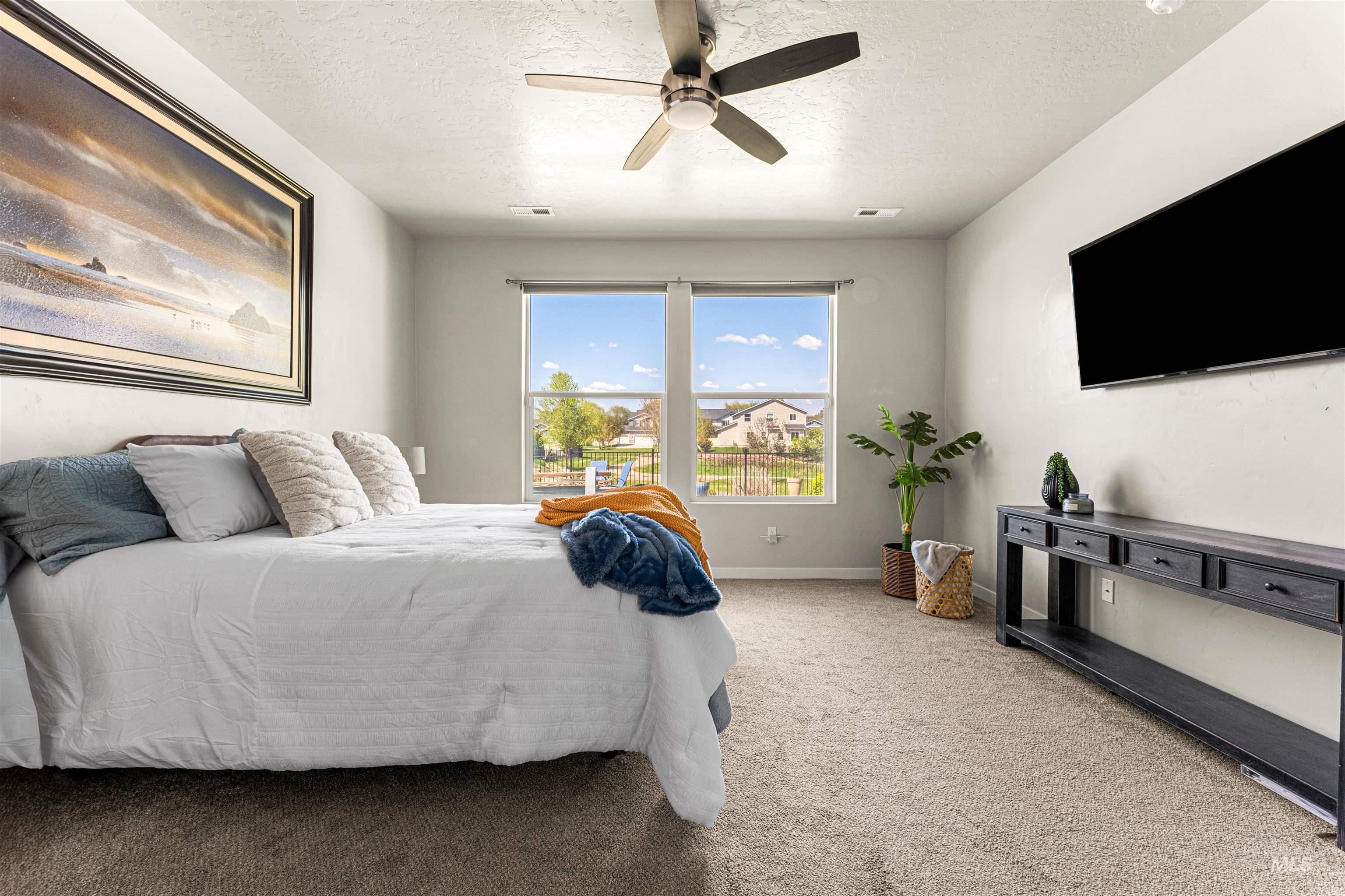 10890 West Sharpthorn Street Boise, ID 83709 - Photo 22 of 50 Spacious room featuring broadloom carpeting and light-toned walls