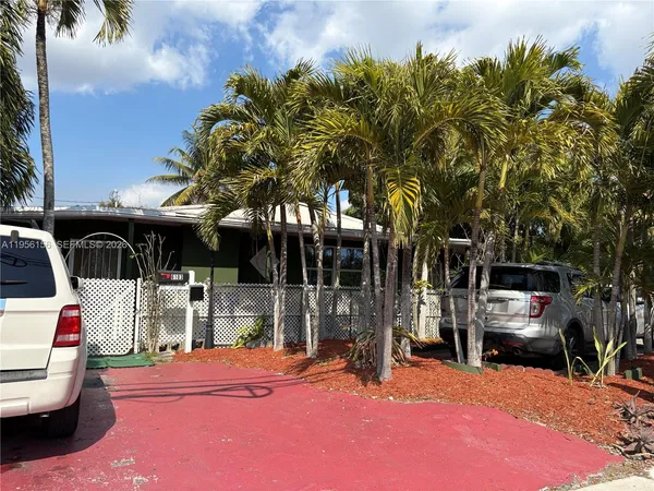 a view of a street with cars