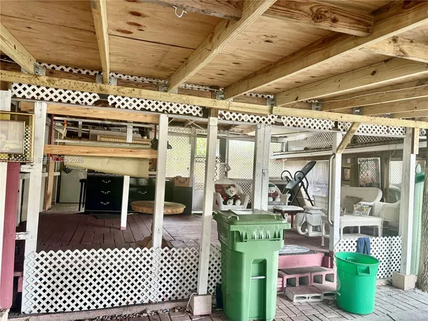 a view of a hallway with a outdoor space
