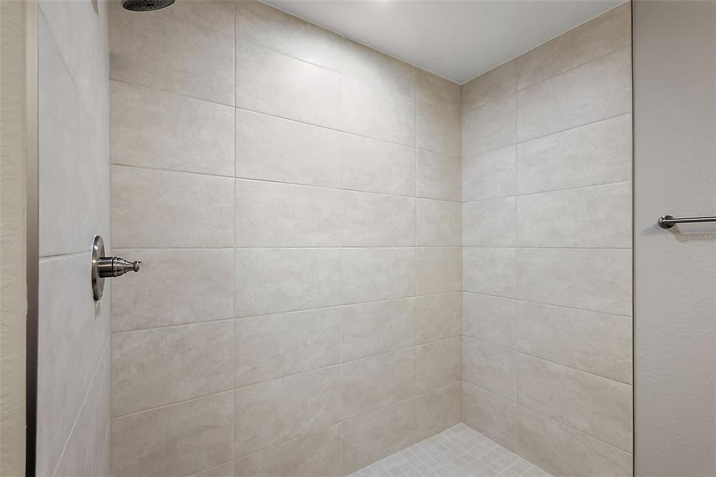 13740 Southwest 89th Street Dunnellon, FL 34432 - Photo 14 of 25 a bathroom with a shower