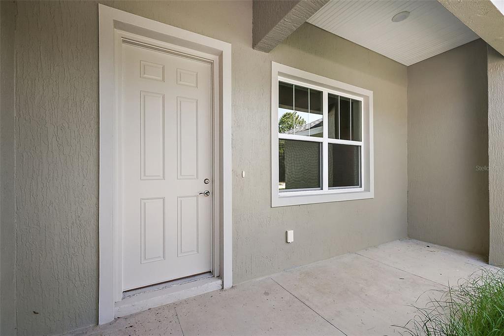 13740 Southwest 89th Street Dunnellon, FL 34432 - Photo 2 of 25 a view of an empty room with a window