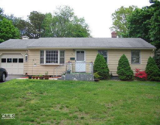 34 Mountain View Road Ansonia, CT 06401 - Photo 1 of 1 a view of a house with a yard and plants