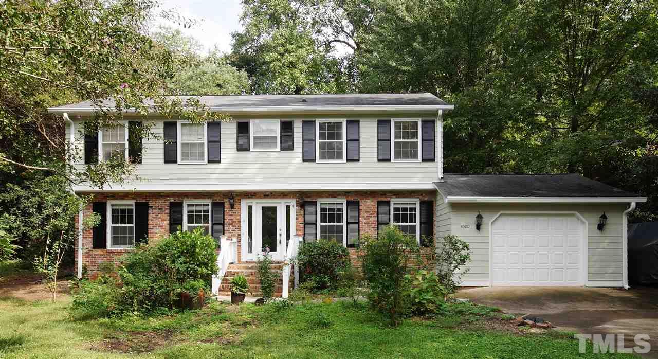 4520 Gates Street Raleigh, NC 27609 - Photo 1 of 11 front view of a house with a yard