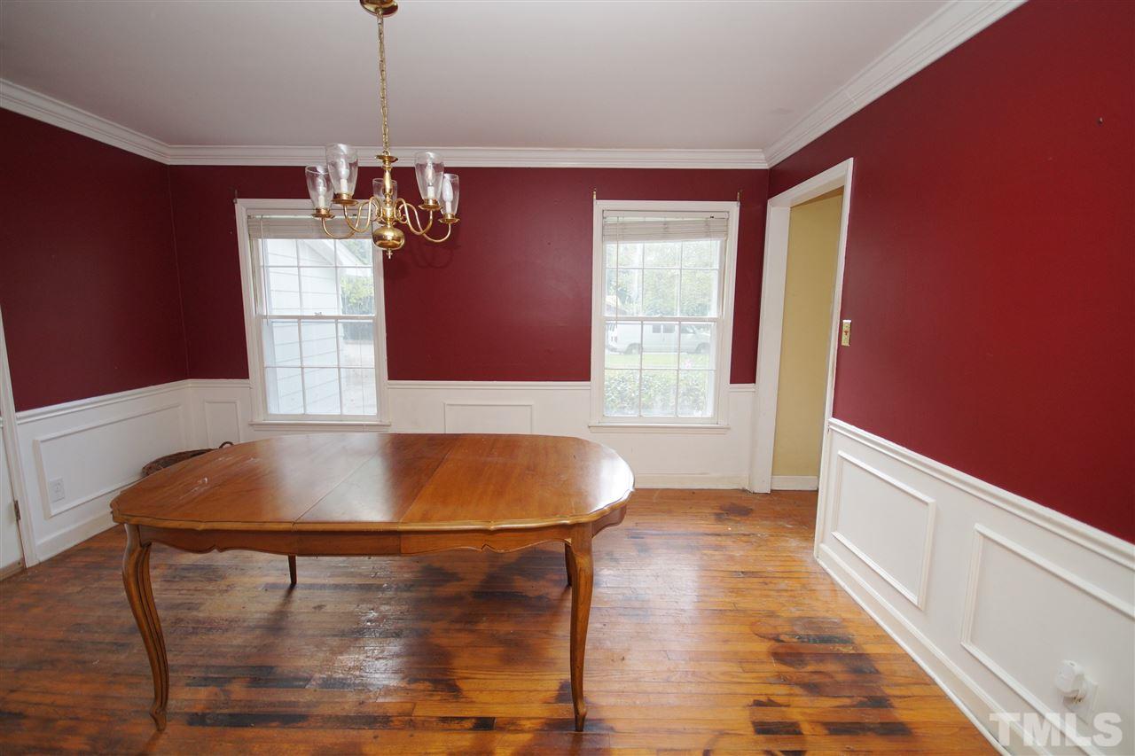 4520 Gates Street Raleigh, NC 27609 - Photo 4 of 11 a room with wooden floor and windows