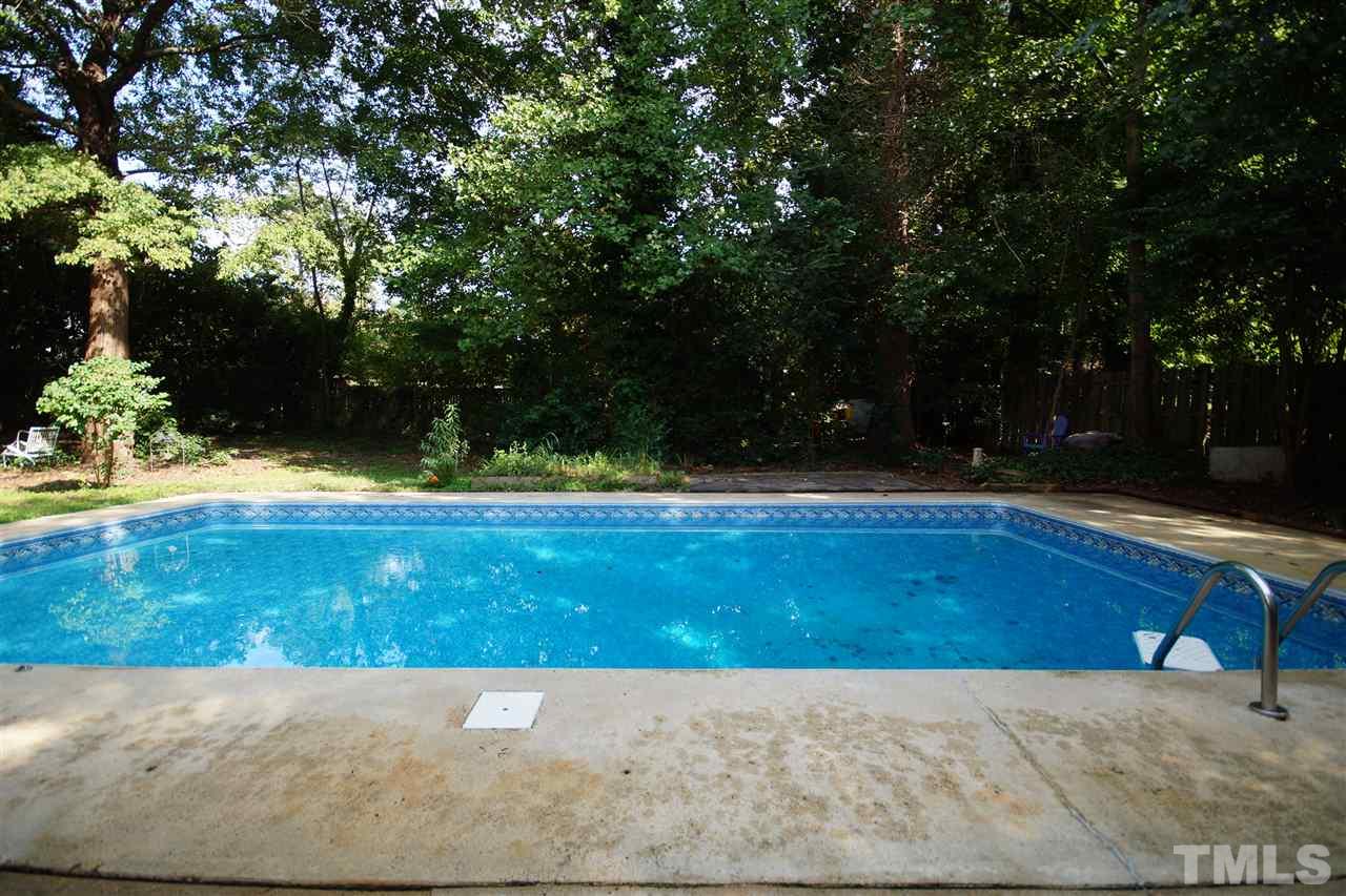 4520 Gates Street Raleigh, NC 27609 - Photo 9 of 11 a view of swimming pool with a yard
