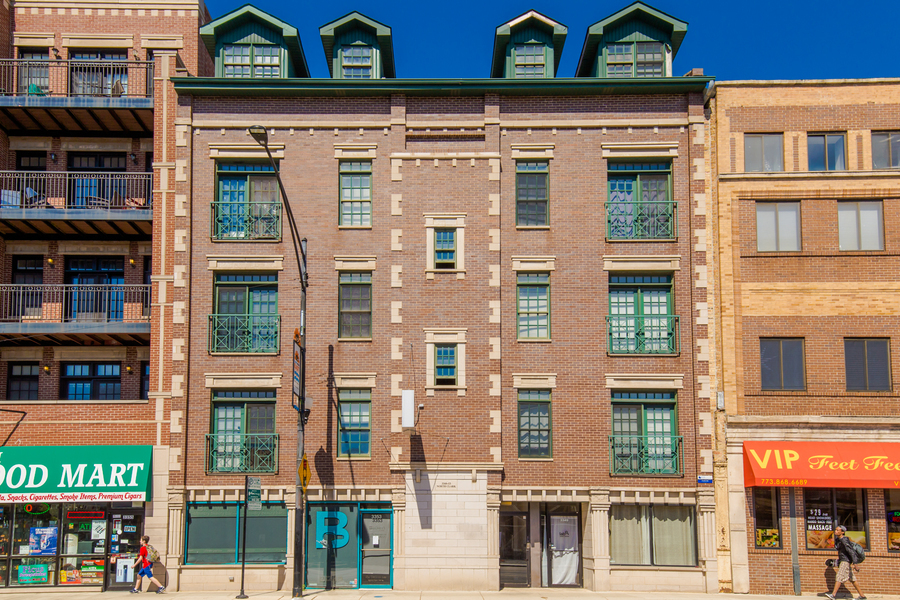 a front view of a multi story building