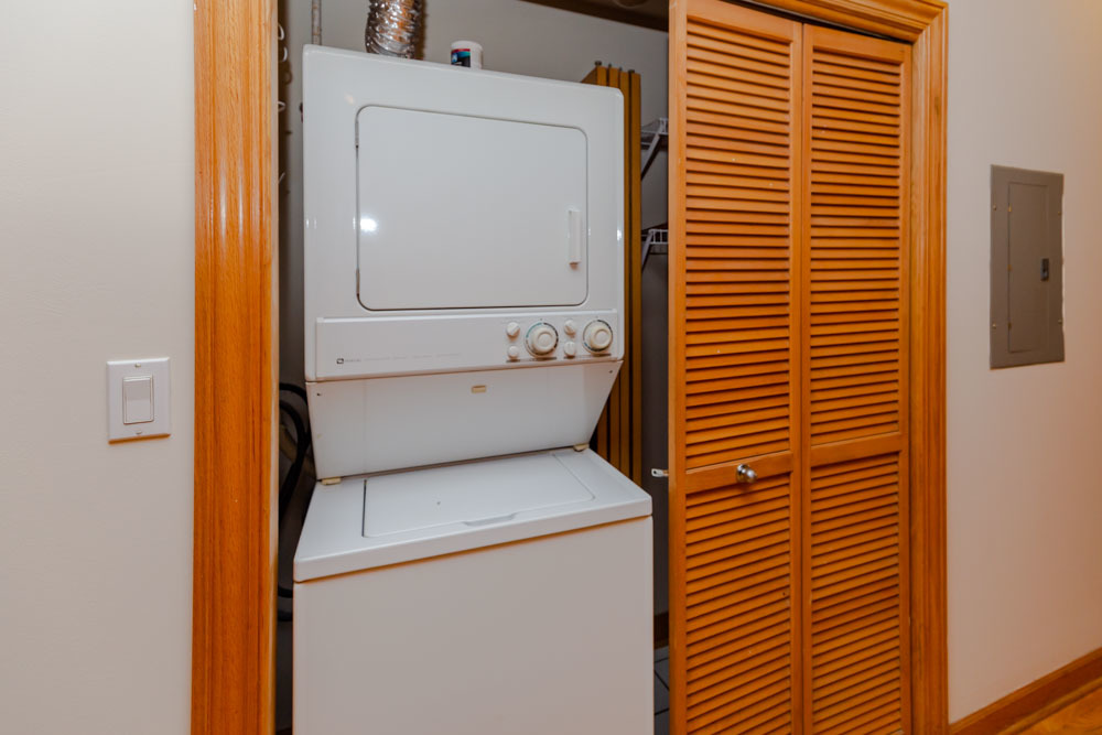 Undisclosed Address Chicago, IL 60657 - Photo 7 of 13 a utility room with dryer and washer