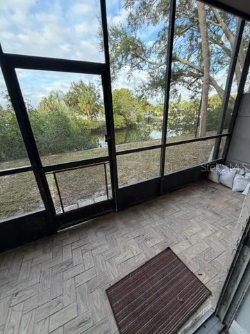 a view of a livingroom with wooden floor